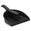 Black plastic dustpan and brush with rubber edge