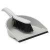 Grey plastic dustpan and brush with rubber edge